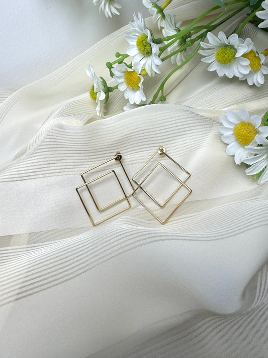 Pendientes doble triángulo